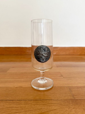 Drink glass with coin like new, collectible crystal stemmed