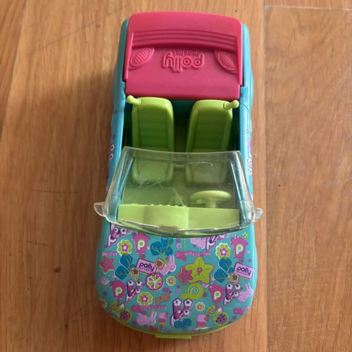 Vintage Polly Pocket set like new with car, dolls, and furniture