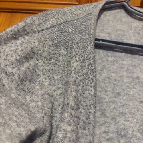 Knitted cardigan like new with embroidered shoulder decorations gray silver