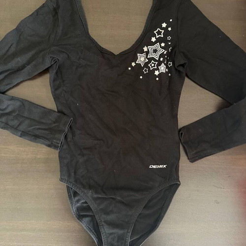 Demix black dance leotard with long sleeves and stars like new, size 128