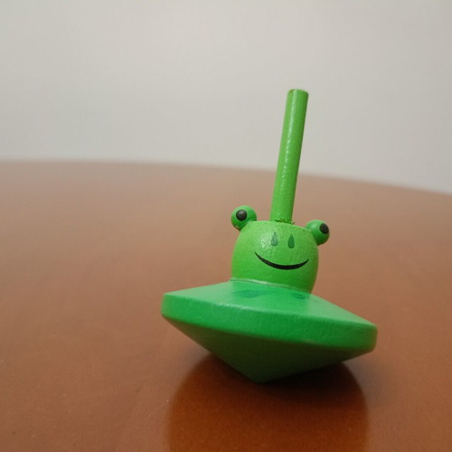 Wooden spinning top "Frog" like new, green traditional toy