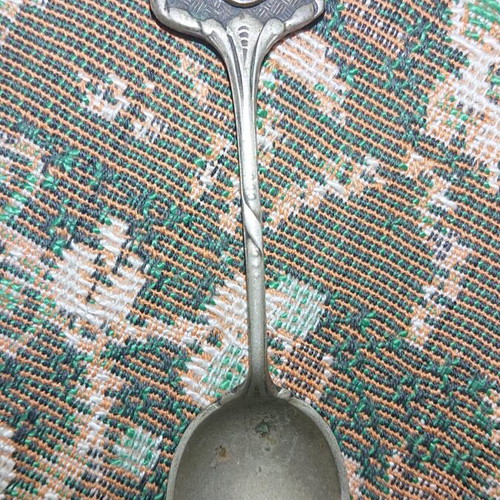 Souvenir spoons used from Isle of Man, Wales and Scotland