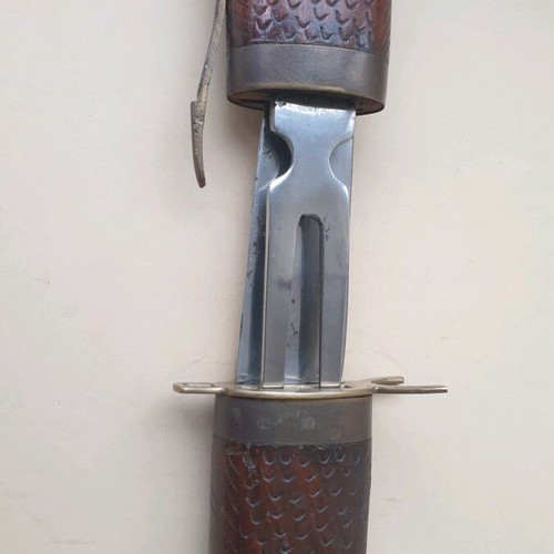 Vintage barbecue set used with knife and fork in wooden sheath