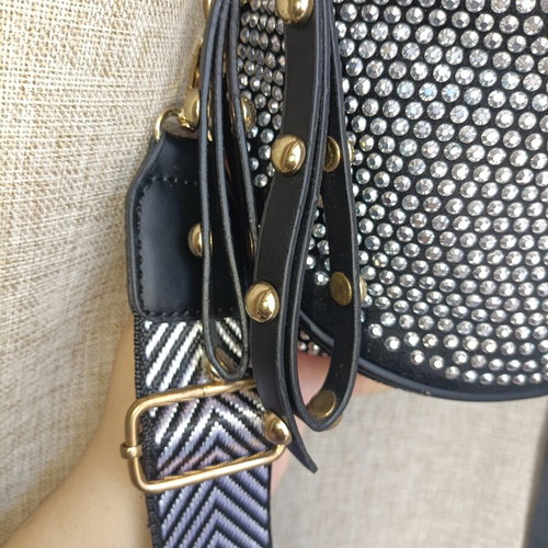 Black crossbody bag with embossed silver rhinestones