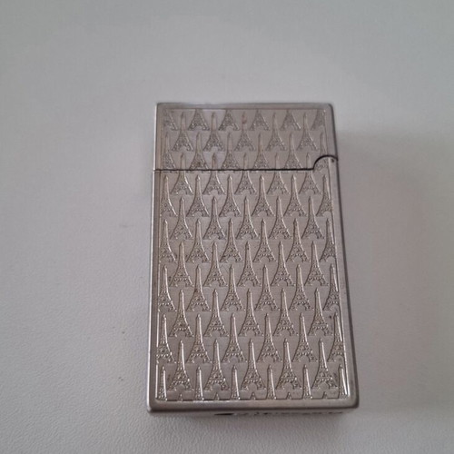 Gas lighter with Eiffel Tower design, like new