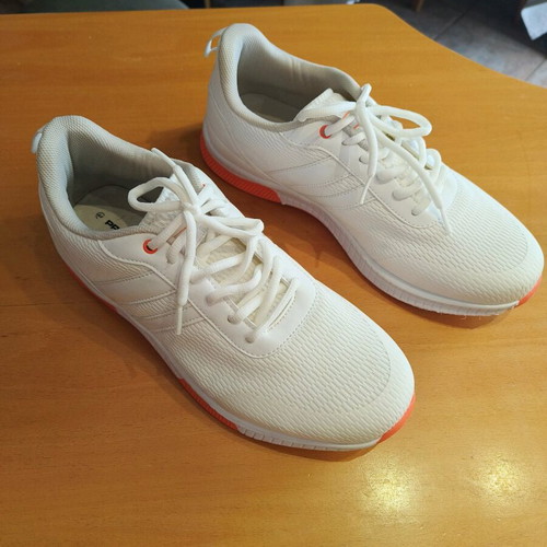 White athletic shoes like new with orange sole size 44