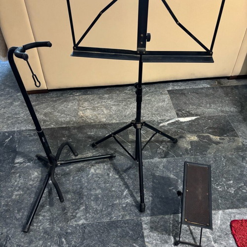 Music stand, guitar floor stand and guitar footrest used
