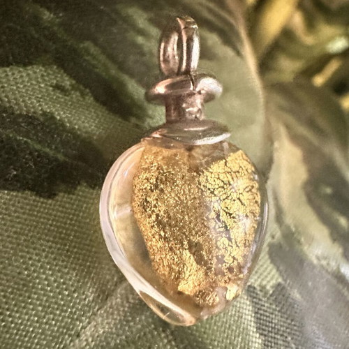 Pendant silver motif with crystal and gold leaves like new