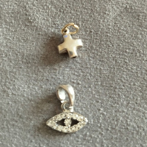 Silver mataki and cross pendants like new