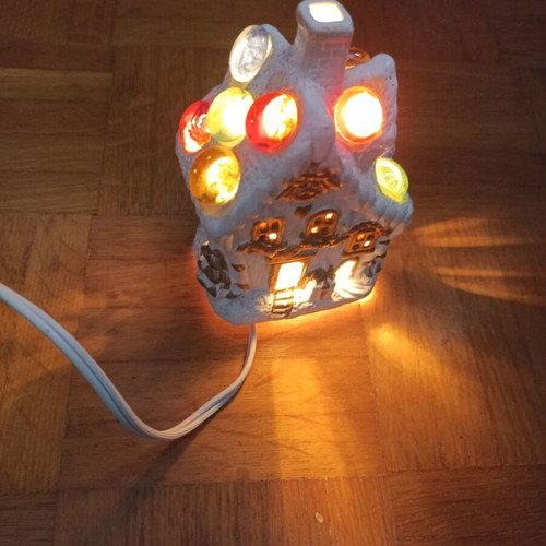 Small white church-shaped lamp with multicolor lights like new