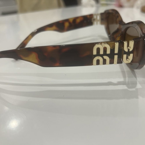 Miu Miu sunglasses like new, brown women's