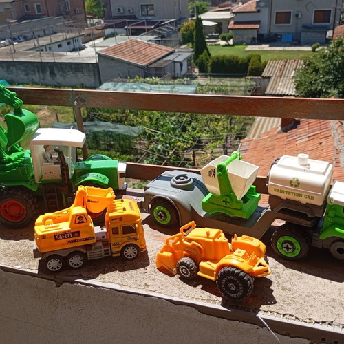 Children's construction and specialized toy trucks set of 4 used