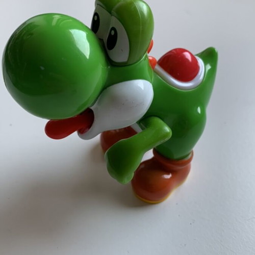 Yoshi figure from McDonald's used collectible with tongue button