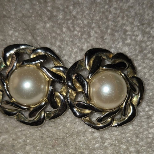 Clip-on earrings used, pack with leather pair
