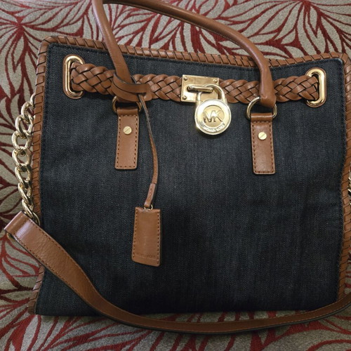 Michael Kors Denim Hamilton handbag used with leather details and gold lock