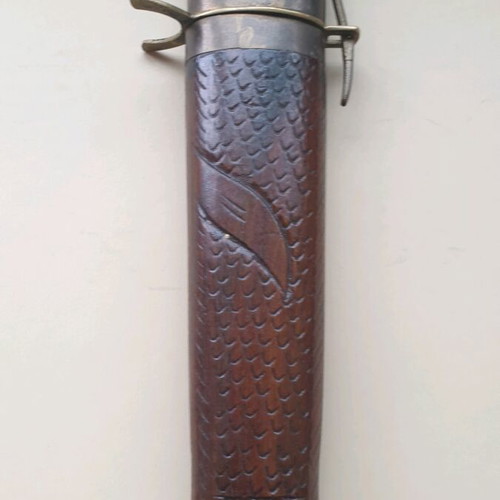 Vintage barbecue set used with knife and fork in wooden sheath