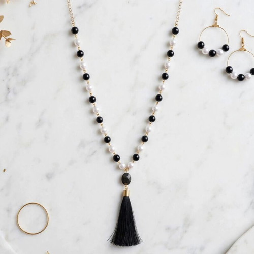 Handmade black and white beaded tassel necklace and earings