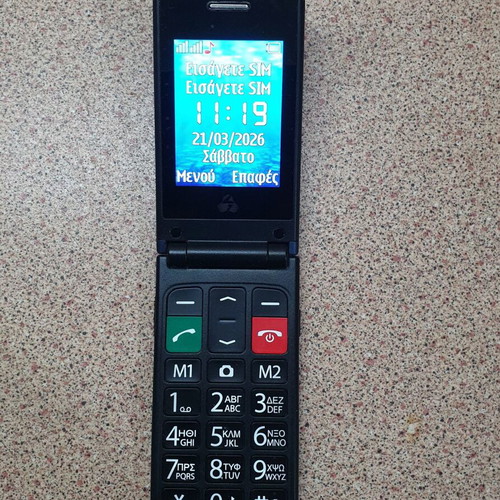 Powerte mobile phone used for seniors with large letters and charging dock