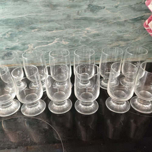 Set of 12 vintage stemmed glasses with etched palm tree