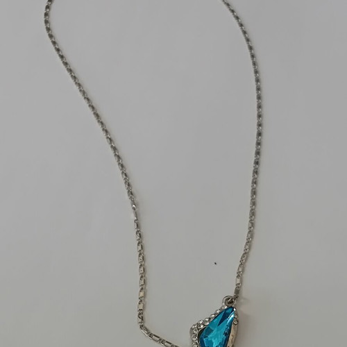 Silver color chain with blue pendant decor, new