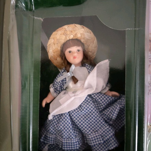 Porcelain doll with wooden seesaw miniature new