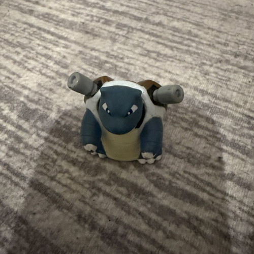 Pokemon Blastoise figure used, with marble