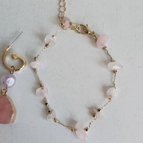 Jewelry set with rose quartz and gold-tone metal elements