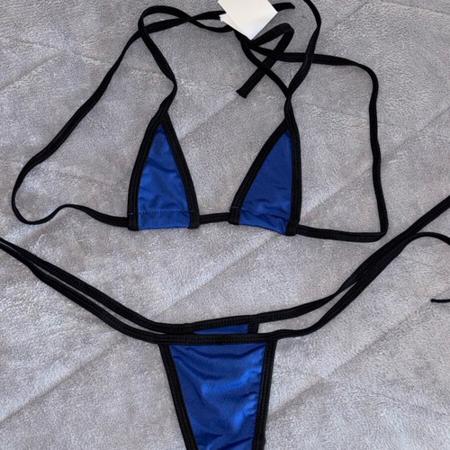Swimsuit new with tags, sizes S/M, black and blue