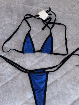 Swimsuit new with tags, sizes S/M, black and blue