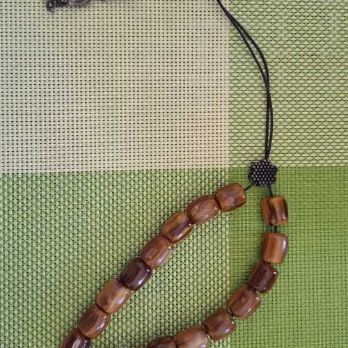 Komboloi with Brown-Honey Beads like new, 17 beads, metal decorations
