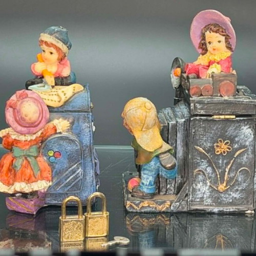 Vintage polyresin piggy banks with three locks and working key