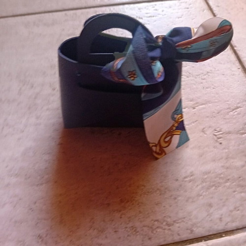 Gift packaging bag made of artificial leather new, blue with ribbon