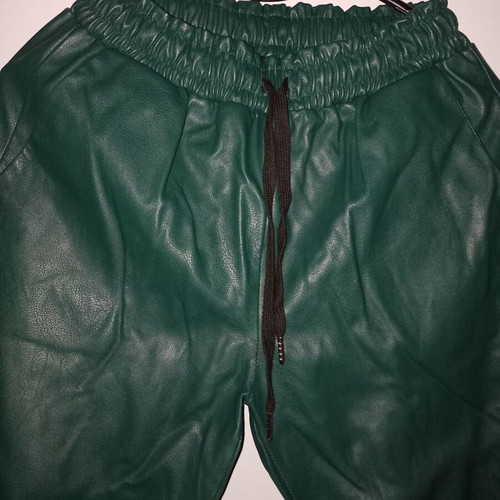 Green faux leather pants with elastic waist and ankle, like new
