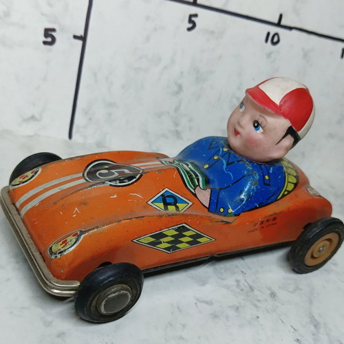 Collectible tin wind-up racing car from the 70s used