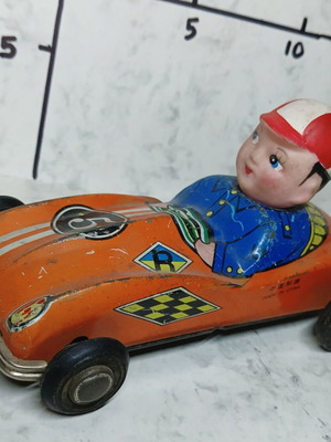 Collectible tin wind-up racing car from the 70s used