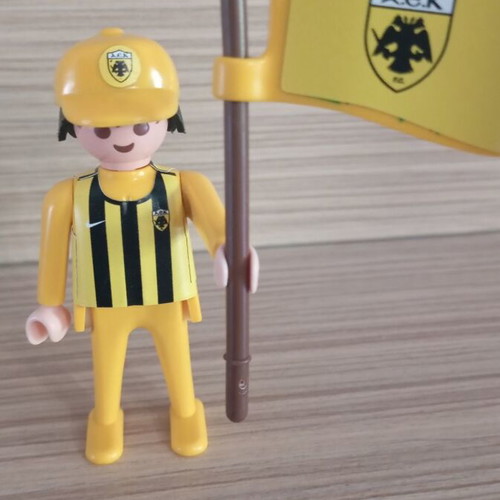 Playmobil AEK fan figure with flag, cap and jersey, like new