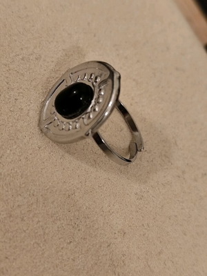 Ring with beautiful design made of stainless steel new, black and silver