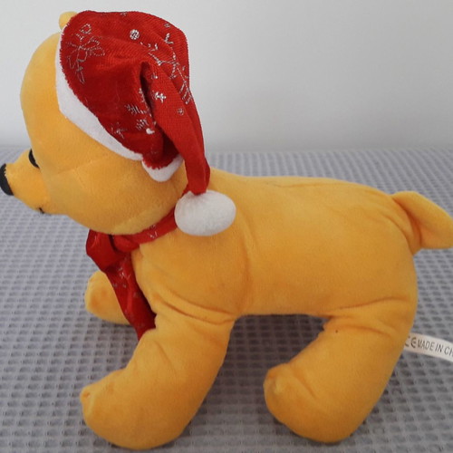 Yellow plush dog used, length 25 cm