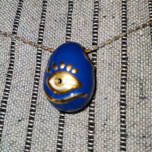 Necklace with eye charm used