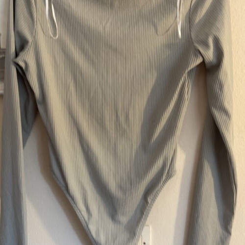 Pink Woman bodysuit M used, green