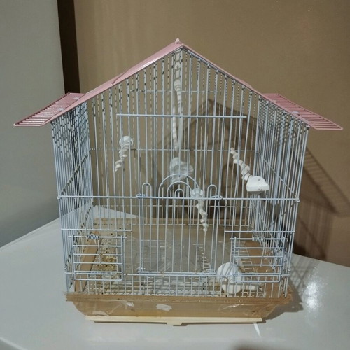 Large birdcage like new with accessories and sand