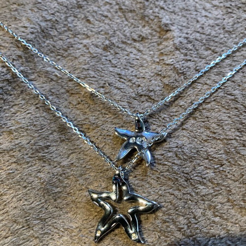 Swarovski double necklace with star pendants like new