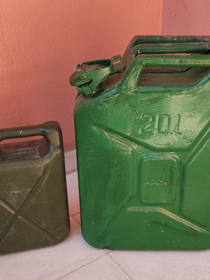 Two military canisters, metal and plastic, functional