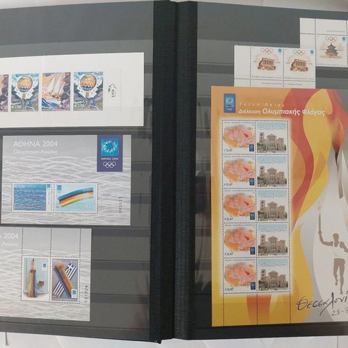 Leuchtturm stamp album with unused 2004 Olympic Games stamps used