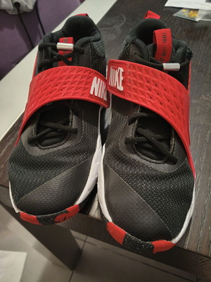 Nike athletic shoes size 38.5, black and red