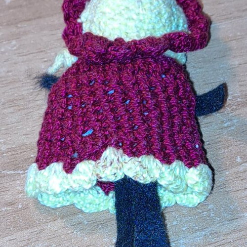 Knitted doll used, as shown