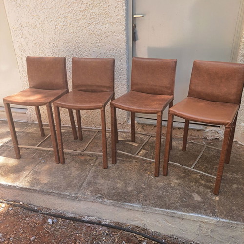 Set of 6 leather-upholstered chairs with metal frame