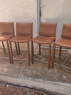 Set of 6 leather-upholstered chairs with metal frame