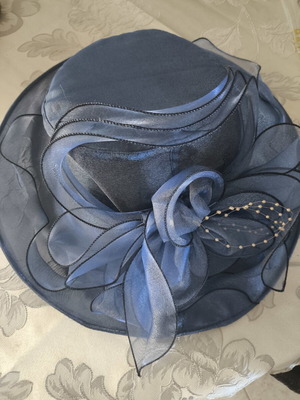 Women's blue fascinator hat like new