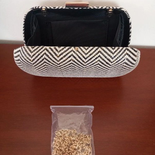 Clutch bag with hard frame, new, black and gold chevron pattern